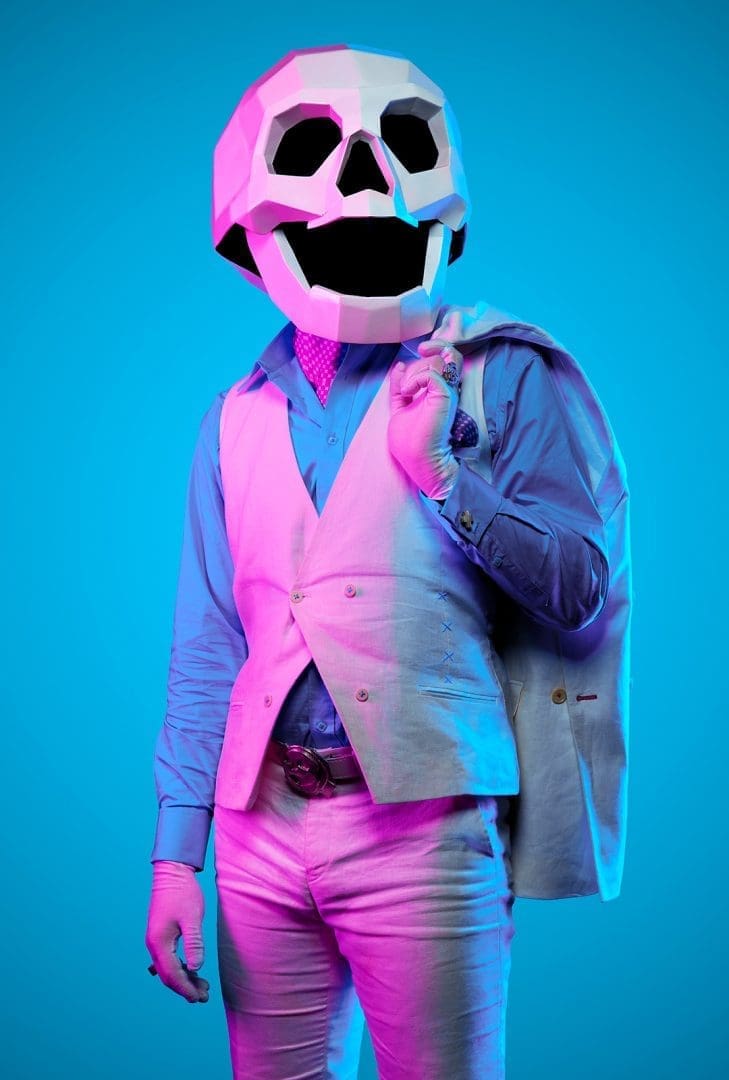 The Dead Happy mascot in purple light