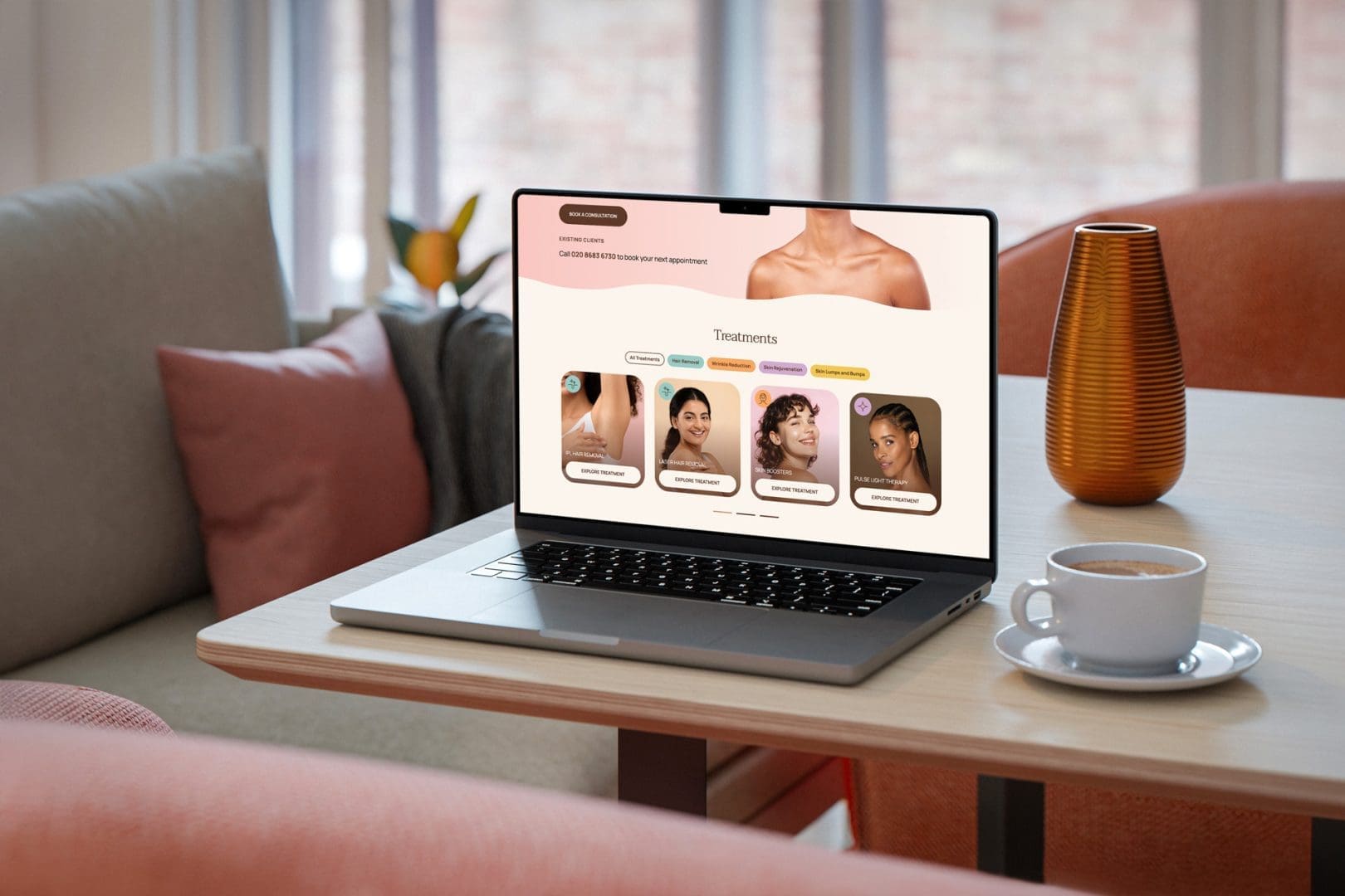 A MacBook showcasing the new website for Numie Skin and Laser Clinic