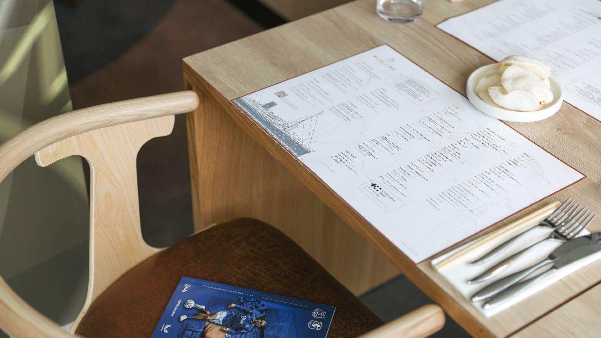 A3 landscape Blue Line menu on restaurant table