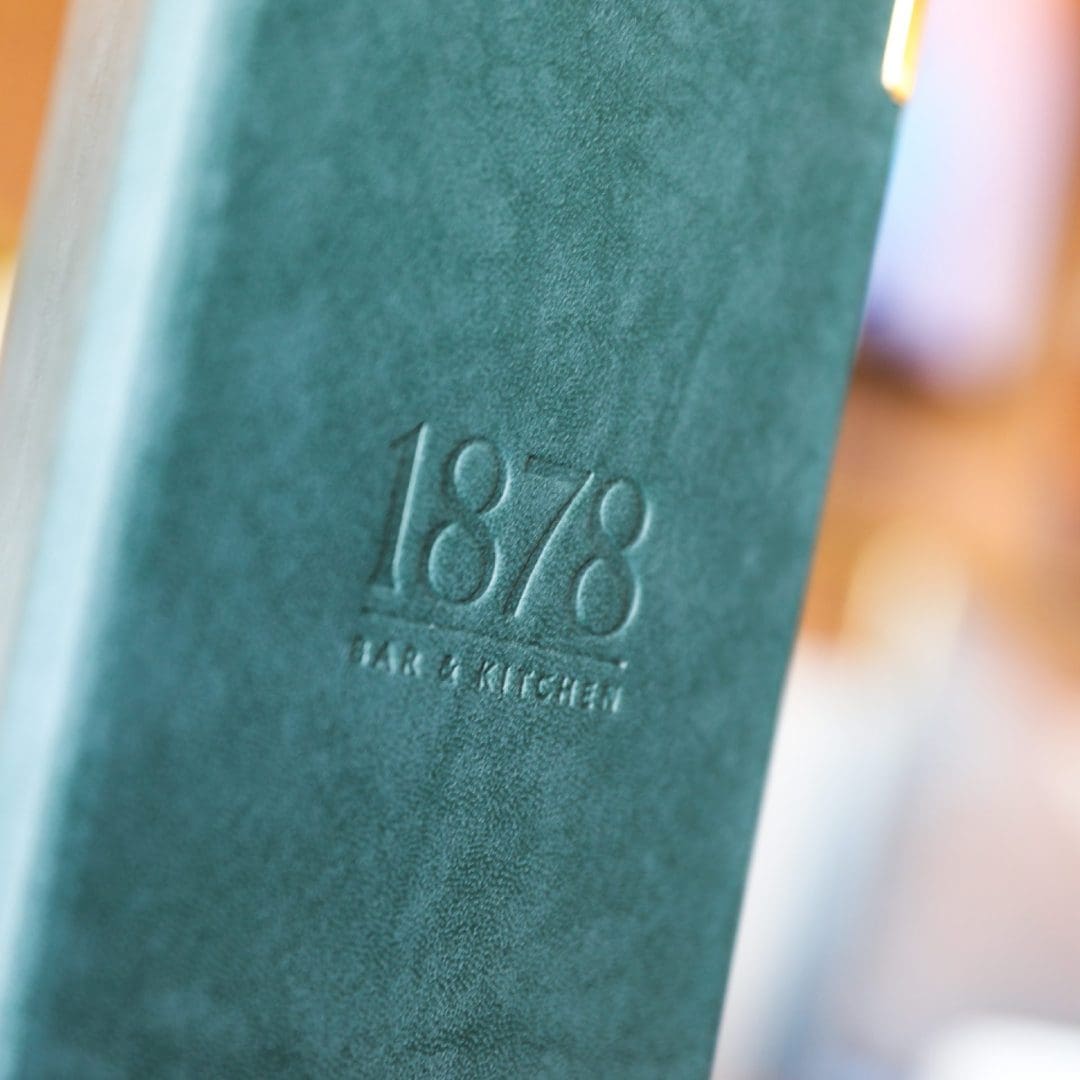 Teal leather 1878 menu folder
