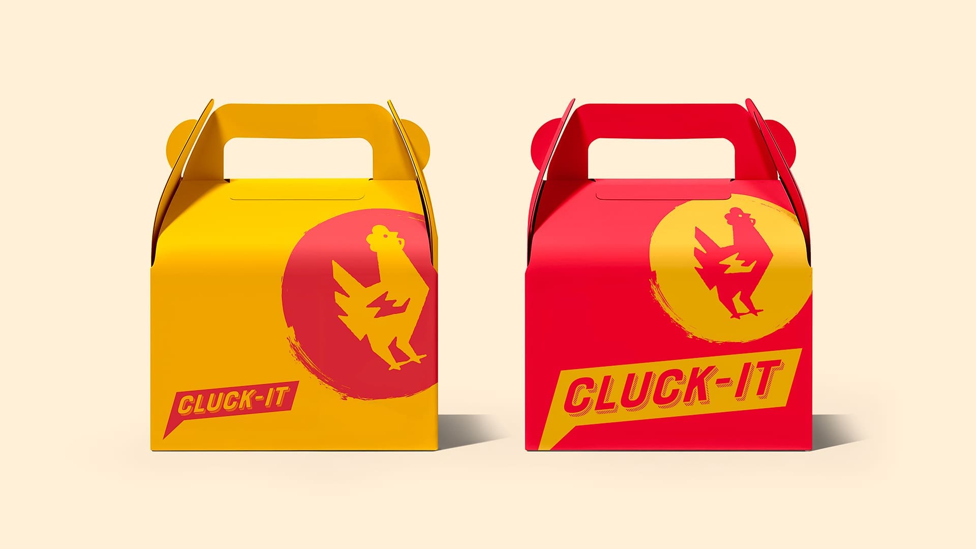 Take out boxes with Cluck It branding and chicken icon on, one red, one yellow.
