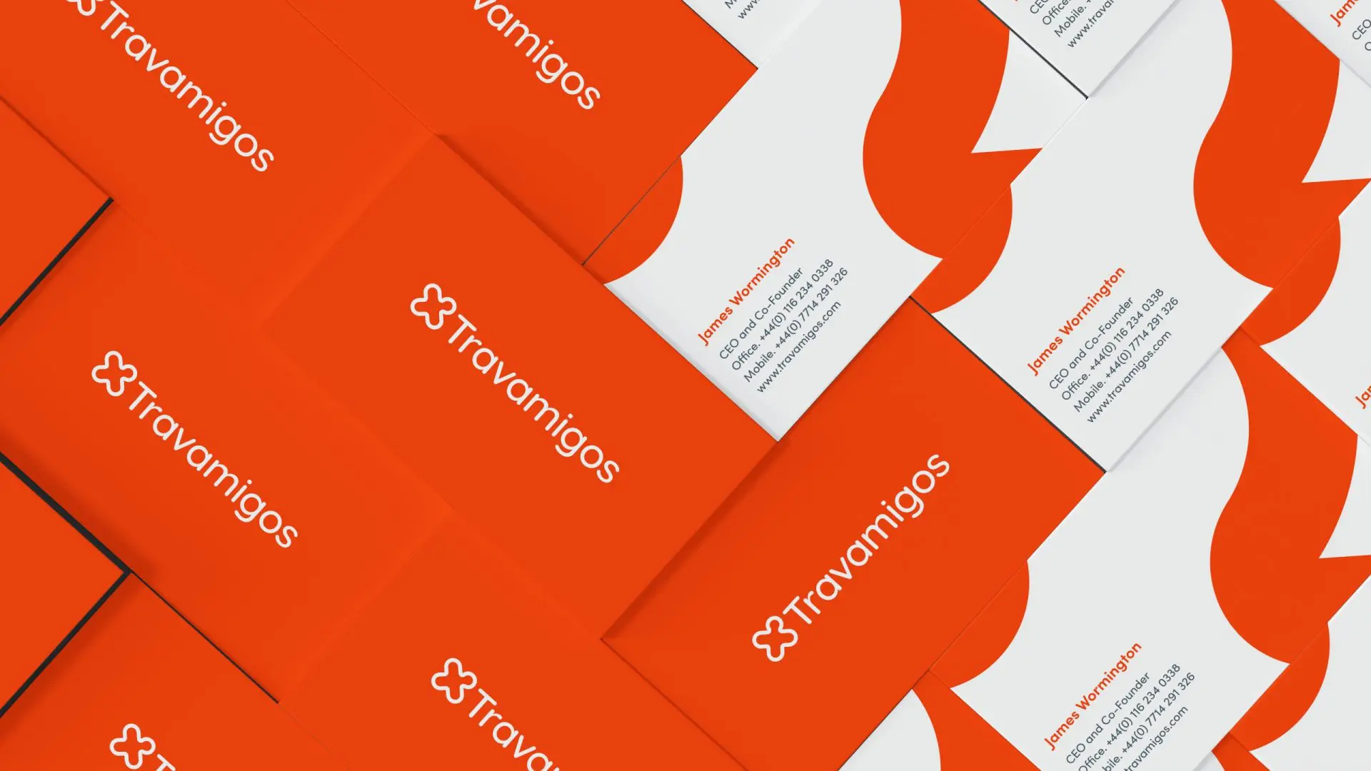 A pile of Travamigos business cards