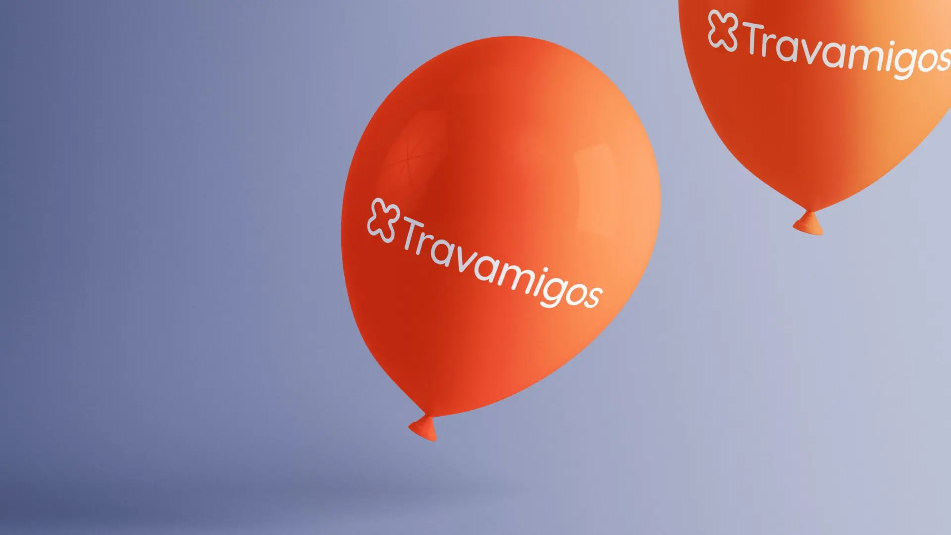 Orange balloons with the Travamigos logo